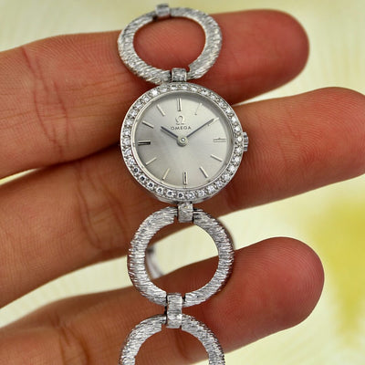 Omega 18k white gold cocktail watch with diamond bezel, 1964