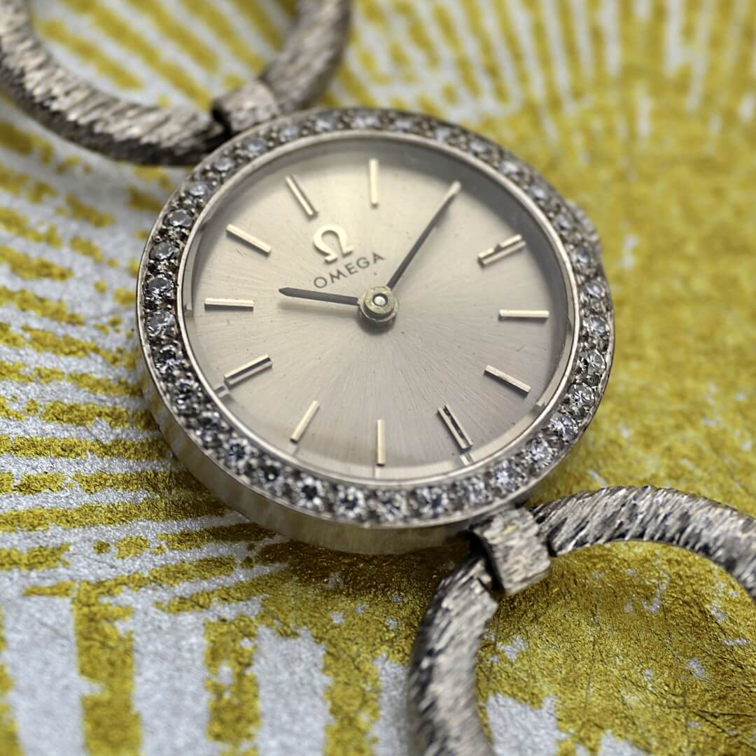 Omega 18k white gold cocktail watch with diamond bezel, 1964